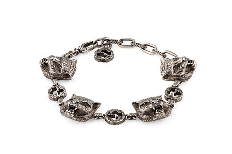 gucci feline head a signature hat|Gucci feline bracelet.